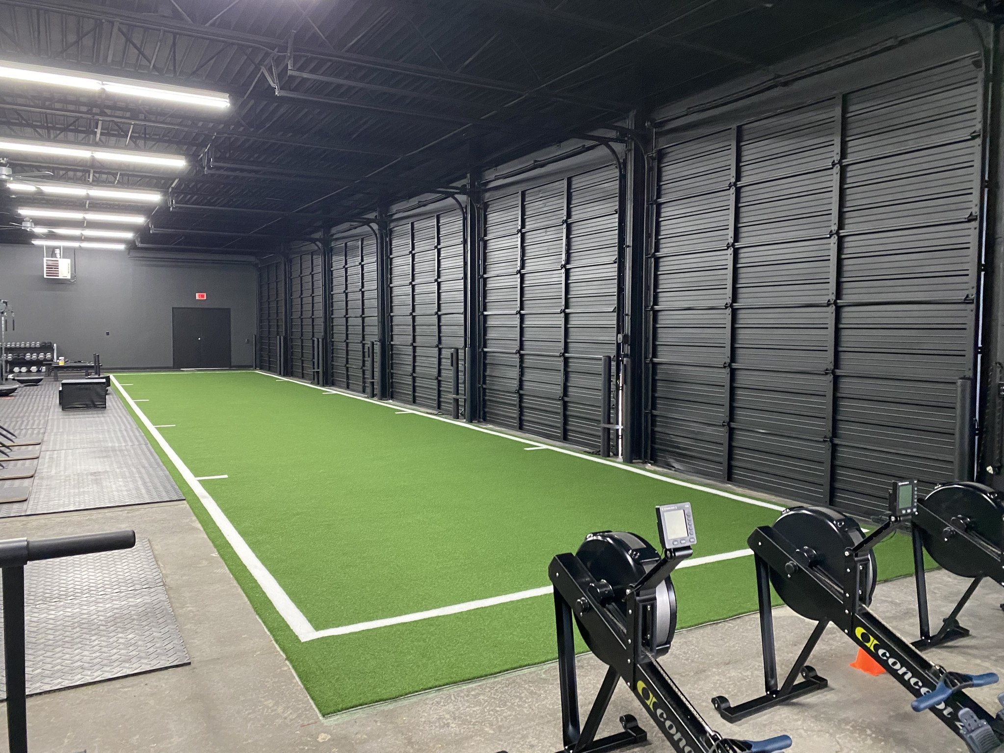 Athletic gym turf installation showing large open training zone in Las Vegas fitness facility